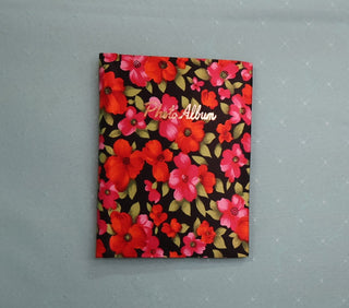 Retro red & pink floral photo album with gold title, holds 48 (4 1/2" x 3 1/4) photos, album removable from cover