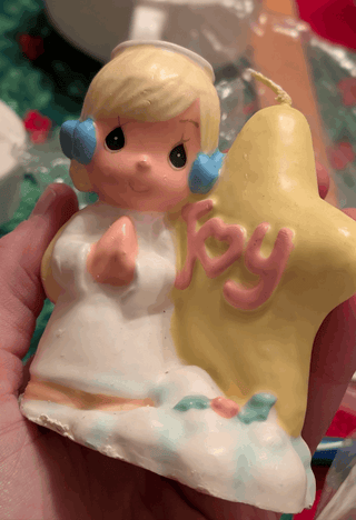 Choice: Precious Moments holiday figurine wax candle