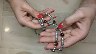 Long necklace with violet pearl beads and gold accents - Artful Accumulator Boutique Vintage