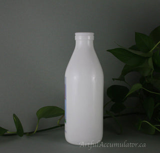 Milk Glass Bottle by Arpac with design: trees with leaves, flowers, storefront -  - #tag1# - #tag2# - #tag3# - #tag4# - the Artful Accumulator's Vintage Boutique