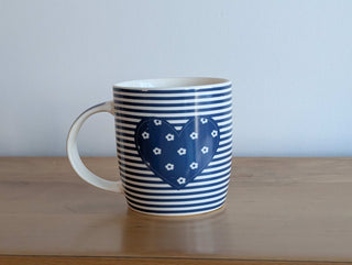 Lovely mug with a heart, flowers, and blue & white stripes