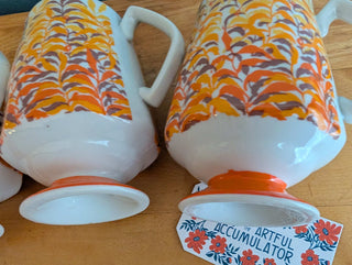 Trio of artisanal ceramic mugs, footed, autumn colors, leafy silhouette decals