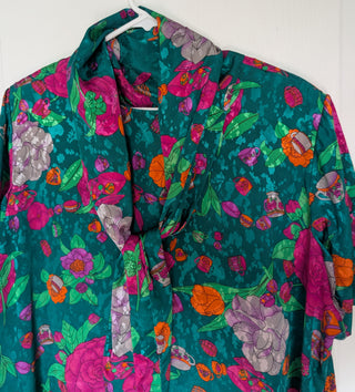 Shiny turquoise Muumuu by Leonard with flowers and teacups