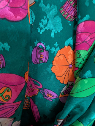 Shiny turquoise Muumuu by Leonard with flowers and teacups