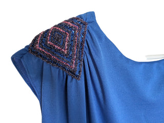 Cobalt Blue blouse with glittery blue shoulder pads and draped back