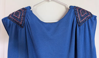 Cobalt Blue blouse with glittery blue shoulder pads and draped back