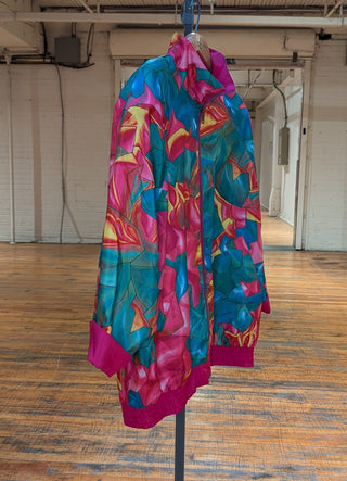 Reversible rosebud windbreaker fractured quartz, floral design, magenta, blue, and deep aqua