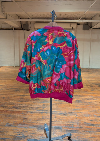 Reversible rosebud windbreaker fractured quartz, floral design, magenta, blue, and deep aqua