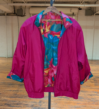 Reversible rosebud windbreaker fractured quartz, floral design, magenta, blue, and deep aqua