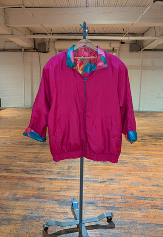 Reversible rosebud windbreaker fractured quartz, floral design, magenta, blue, and deep aqua