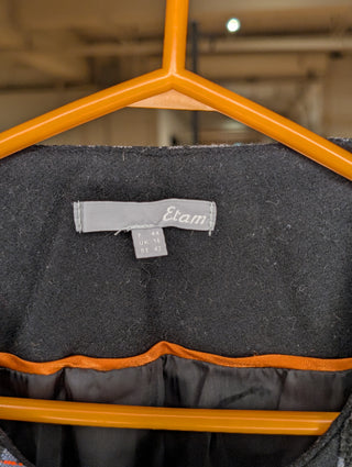 Black and grey embroidered coat with offset zipper