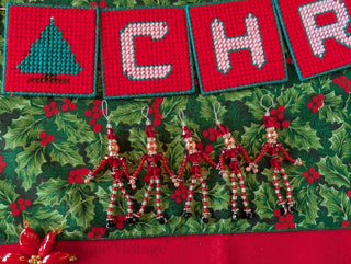 set of 5, beaded miniature nutcracker men with hanging string handmade
