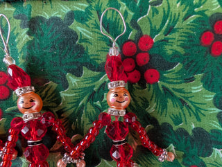 set of 5, beaded miniature nutcracker men with hanging string handmade