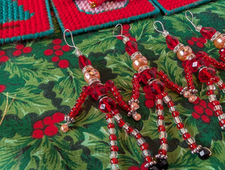 set of 5, beaded miniature nutcracker men with hanging string handmade
