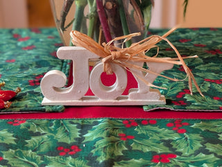 small JOY! banner with straw bow and ivory enamel