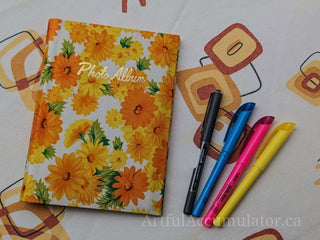 Retro orange & yellow floral photo album with gold title, holds 48 4 5/8 x 3 1/4 photos, album removable from cover -  - #tag1# - #tag2# - #tag3# - #tag4# - the Artful Accumulator's Vintage Boutique