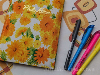 Retro orange & yellow floral photo album with gold title, holds 48 4 5/8 x 3 1/4 photos, album removable from cover -  - #tag1# - #tag2# - #tag3# - #tag4# - the Artful Accumulator's Vintage Boutique