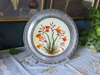Round floral lucite casting with pewter frame - Artful Accumulator Boutique Vintage