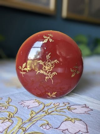 Trinket bureau jar with 24kt gold lustre and a decal of a beautiful woman in a feathered hat with curly hair and bows. Brass clasp & hinge. -  - #tag1# - #tag2# - #tag3# - #tag4# - the Artful Accumulator's Vintage Boutique