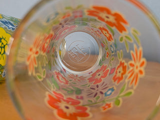 Trio of medium-sized tumblers with orange and green floral patterns - Artful Accumulator Boutique Vintage