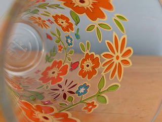Trio of medium-sized tumblers with orange and green floral patterns - Artful Accumulator Boutique Vintage