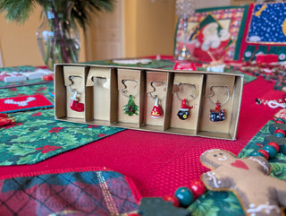 party set of 5 Christmas-themed wine charms made from lamp-worked glass - Artful Accumulator Boutique Vintage