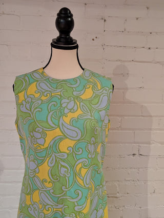 Mod style vintage dress in light blue, green, and yellow. lined