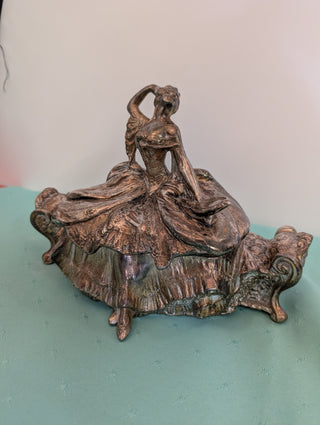 Weidlich Brothers silver casket jewelry box with a woman in a dress holding a hand mirror