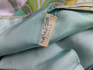 Mod style vintage dress in light blue, green, and yellow. lined