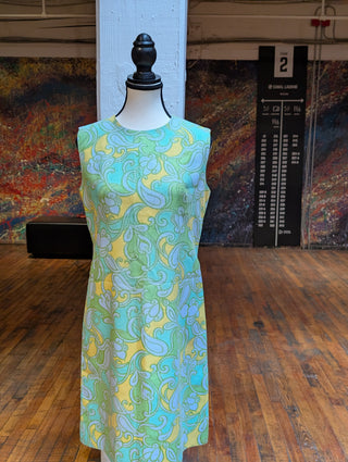 Mod style vintage dress in light blue, green, and yellow. lined
