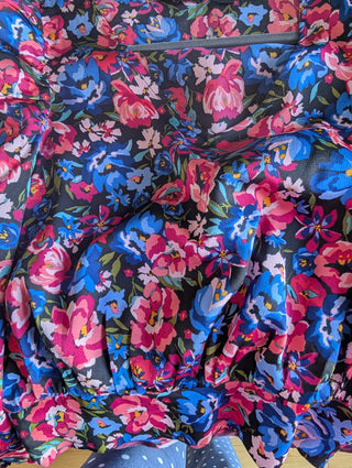 Modern cropped pink & blue spring flowers blouse on deep blue, puffed bishop long sleeves