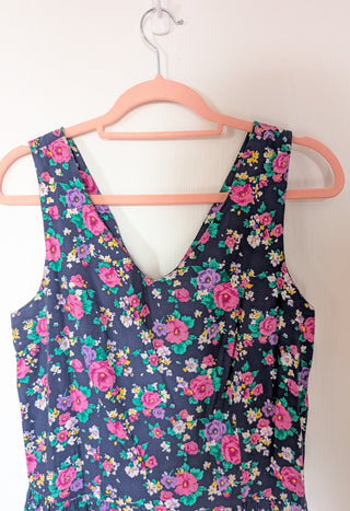 Belladonna - fit & flare drop waist dress - bouquets of pink, purple, white, and yellow flowers with green leaves on a dark blue background