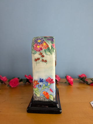 Ceramic Clock, Arch shaped, floral imagery with subtle 3d effect