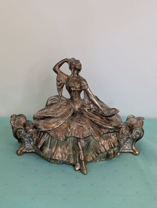 Weidlich Brothers silver casket jewelry box with a woman in a dress holding a hand mirror