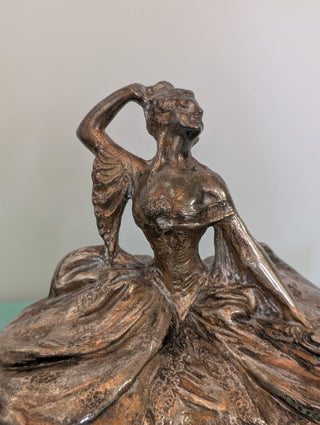 Weidlich Brothers silver casket jewelry box with a woman in a dress holding a hand mirror