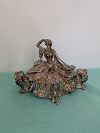 Weidlich Brothers silver casket jewelry box with a woman in a dress holding a hand mirror