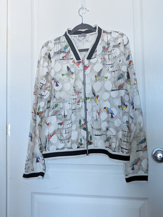 white tulle mesh with circles, zip up see through cardigan with colorful flying birds and bird cages