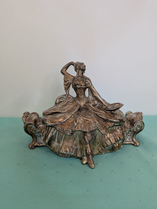 Weidlich Brothers silver casket jewelry box with a woman in a dress holding a hand mirror