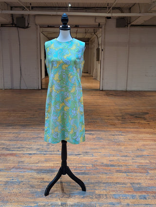 Mod style vintage dress in light blue, green, and yellow. lined