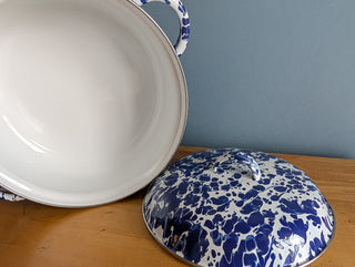 speckled blue and white pot enamelware splatter design, with side handles, silver rim, and a fitted lid with top handle