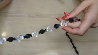 Dramatic alternating Black, clear, organicly shaped, with silver spacer beads