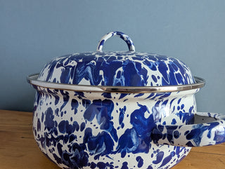 speckled blue and white pot enamelware splatter design, with side handles, silver rim, and a fitted lid with top handle